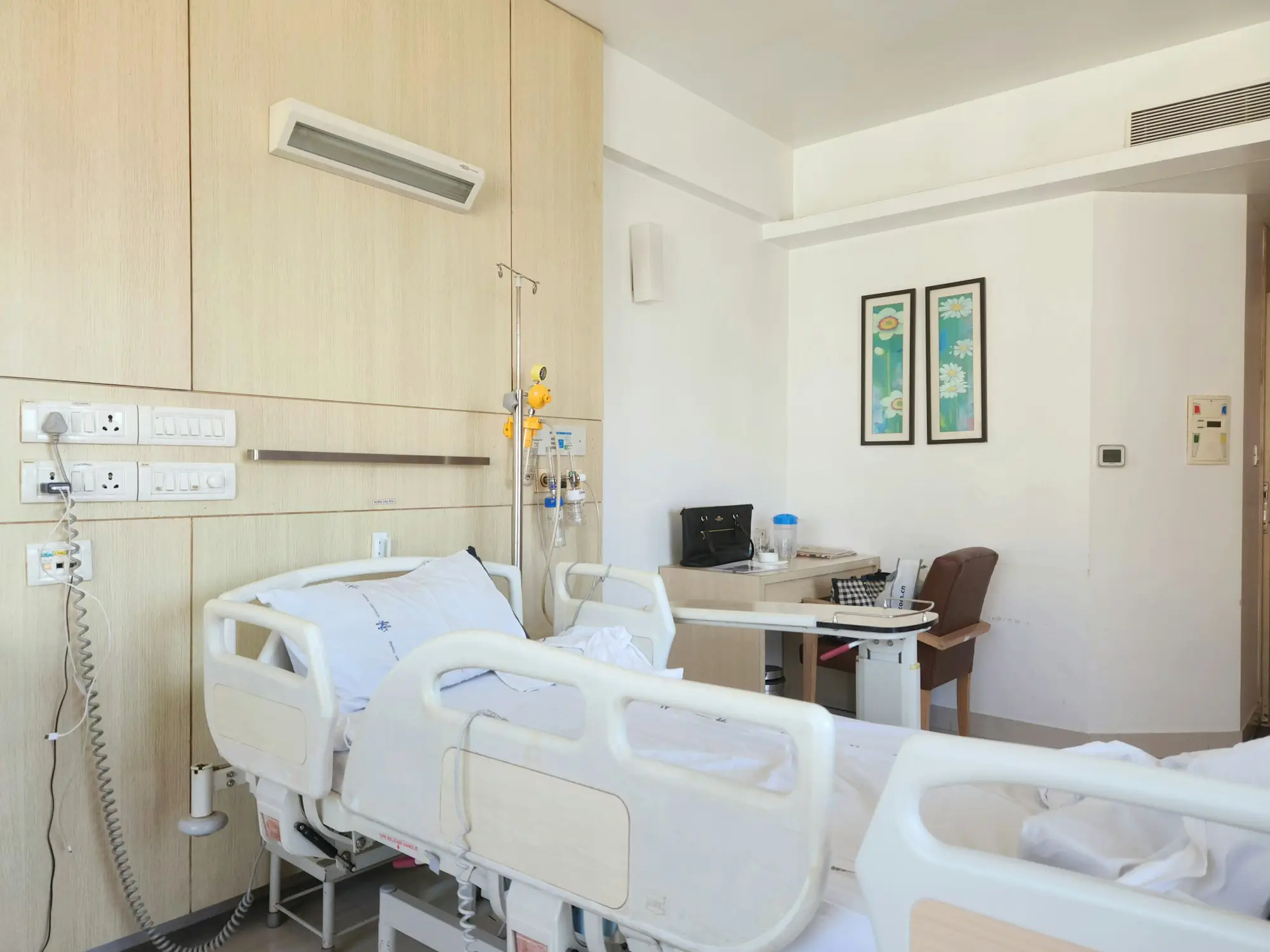 Newly fitted clinic room with beds and modern equipment